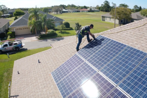 solar panel being installed on residential roof to increase home value